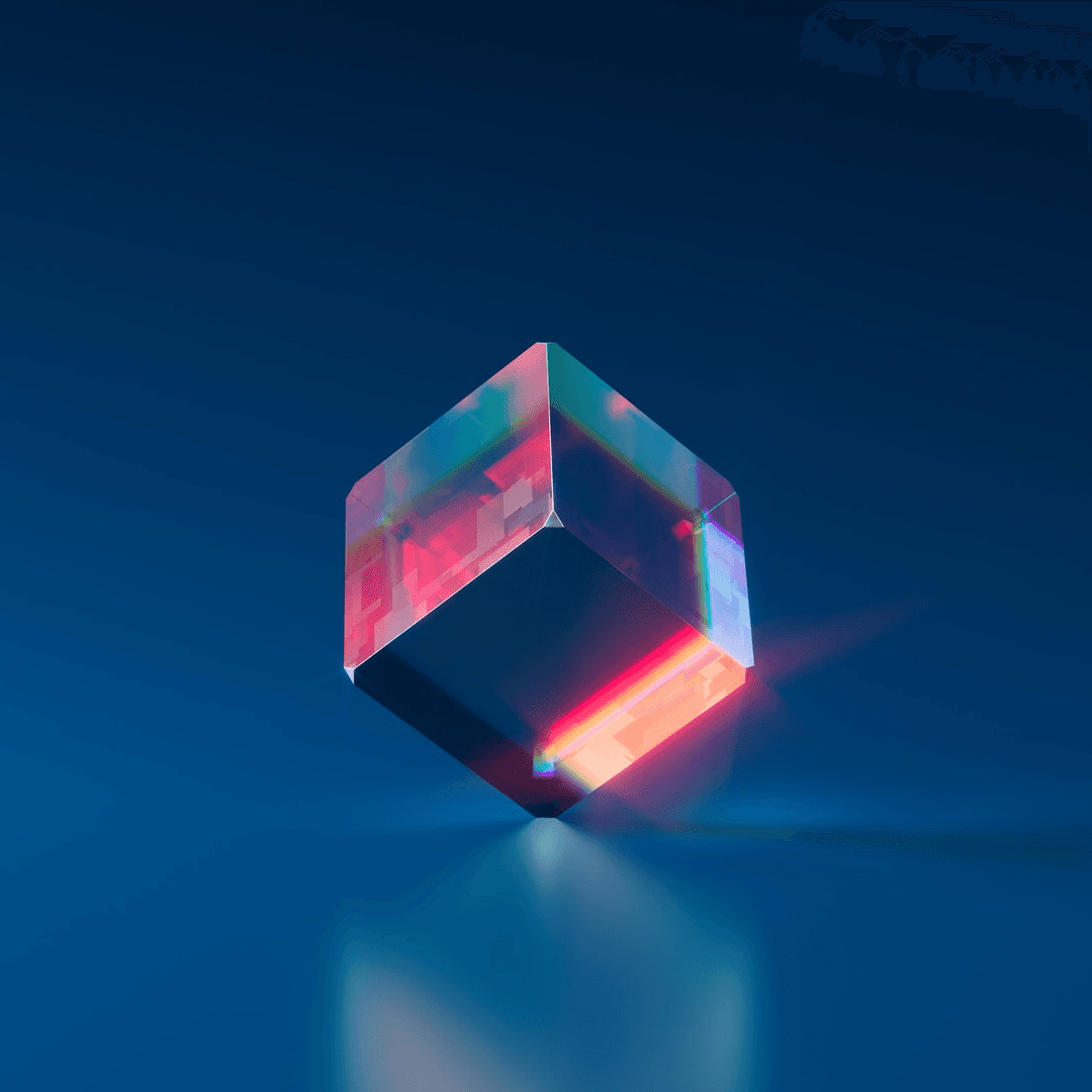 Futuristic translucent cube emitting vibrant neon light reflections on a smooth blue surface.